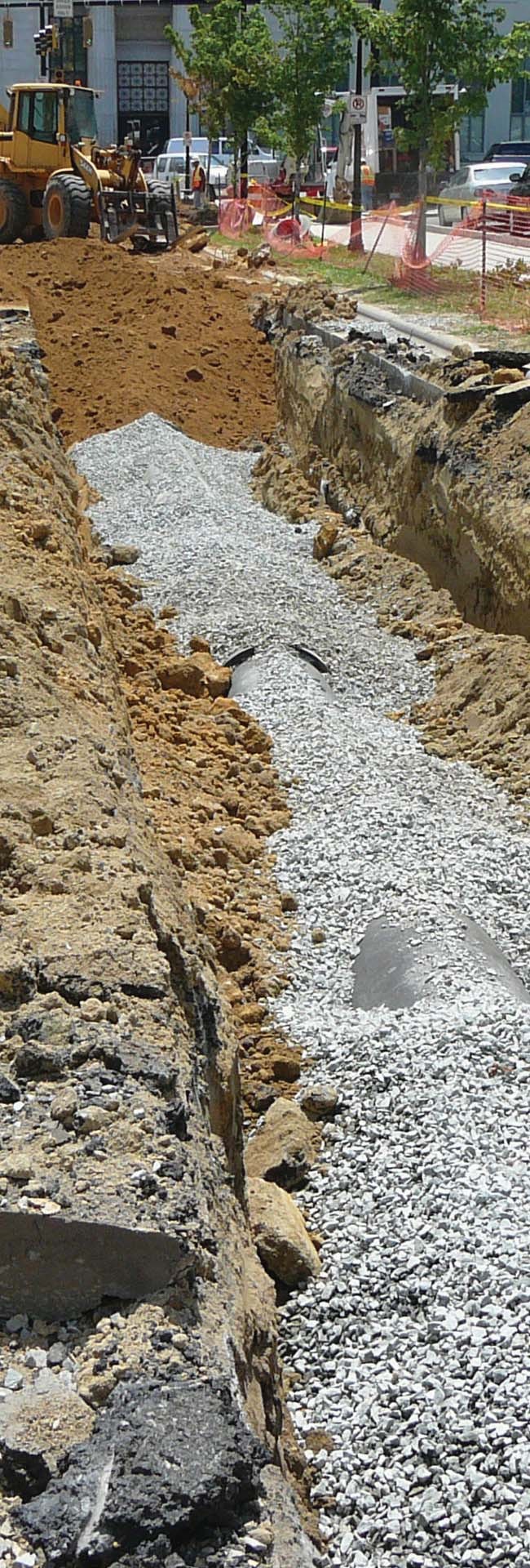 Water main trench during utility relocation work